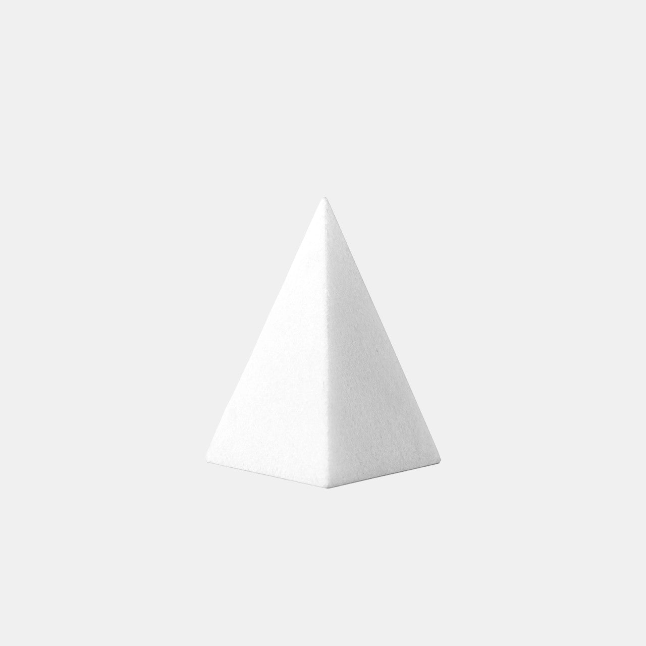 The elegant Thassos White Marble Large Pyramid Sculpture is meticulously arranged in a striking triangle shape, set against a subtle, neutral-toned background for a sophisticated look.