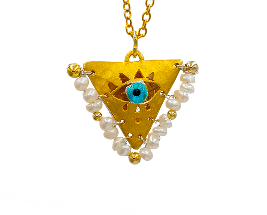 Gold-plated silver evil eye necklace with pearl beads, handcrafted Filakto lucky charm jewelry.