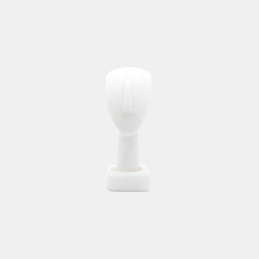Head of a Figurine, Triangle Spedos, Naxos Marble, Cycladic Art - Minimalist white marble sculpture of a human head with triangular shaped face originating from Naxos, Greece, exemplifying ancient Cycladic art style.