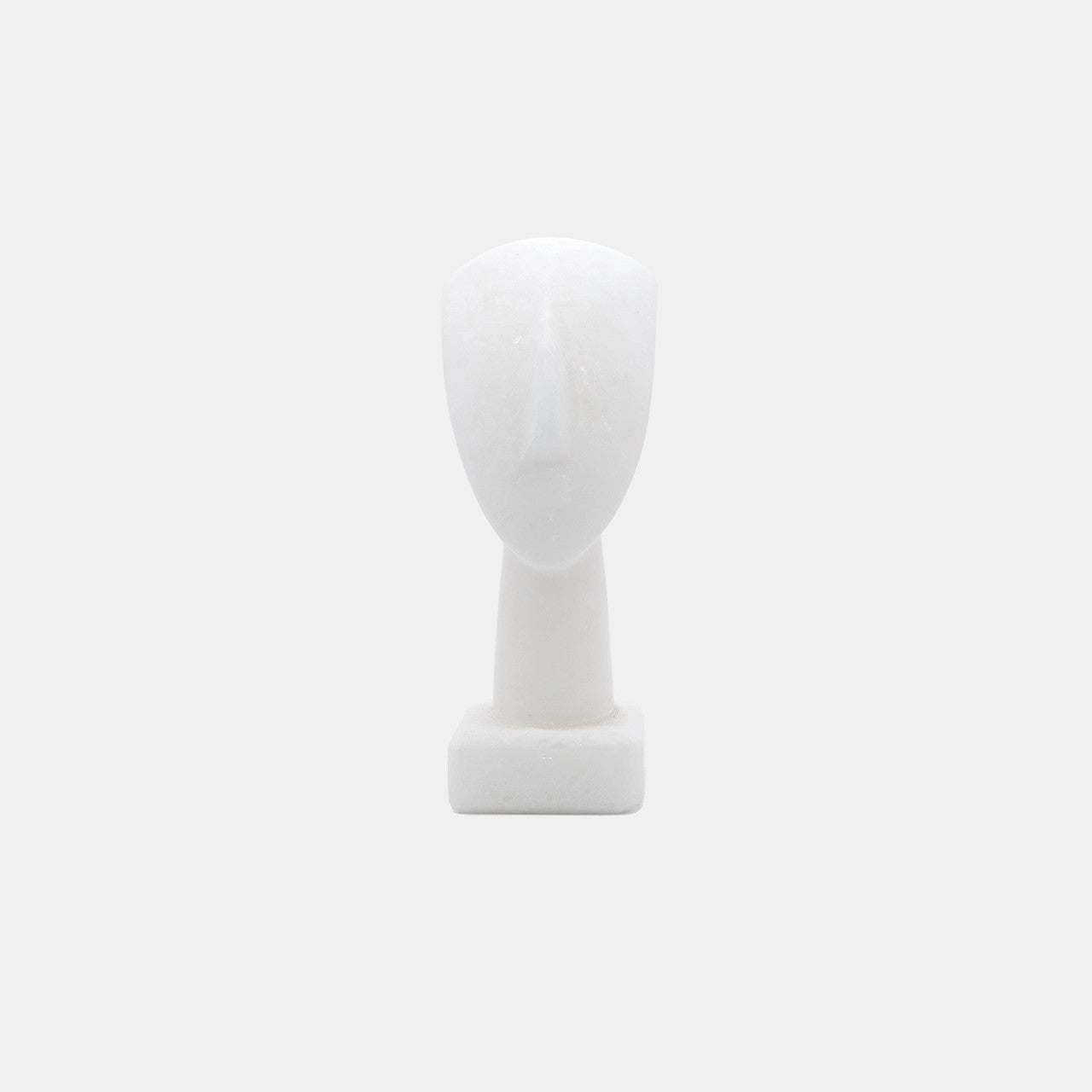 Head of a Figurine, Triangle Spedos, Naxos Marble, Cycladic Art - Minimalist white marble sculpture of a human head with triangular shaped face originating from Naxos, Greece, exemplifying ancient Cycladic art style.