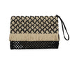 Close up of boho natural straw pouch in black and beige