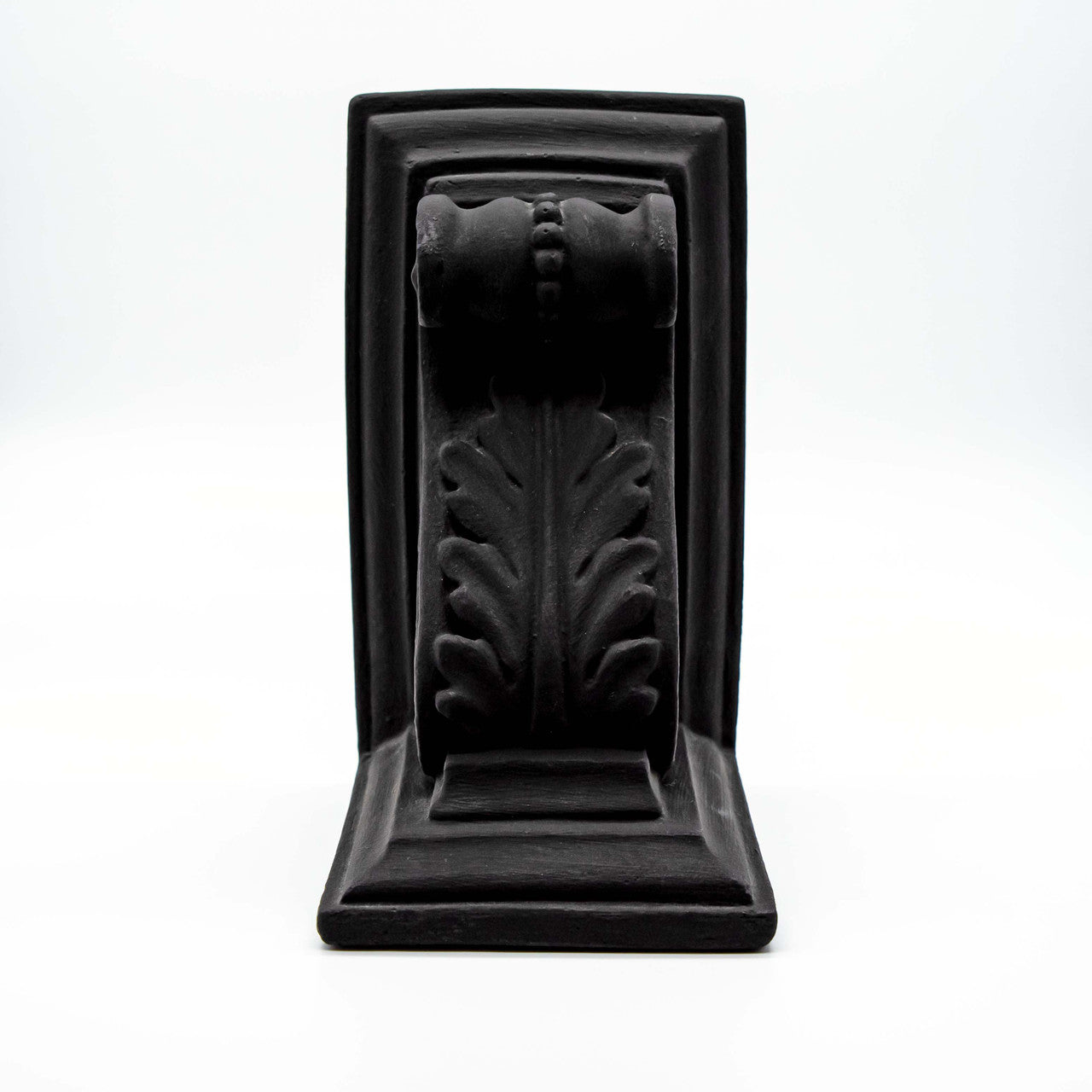 Close up of akrokeramo book end in black