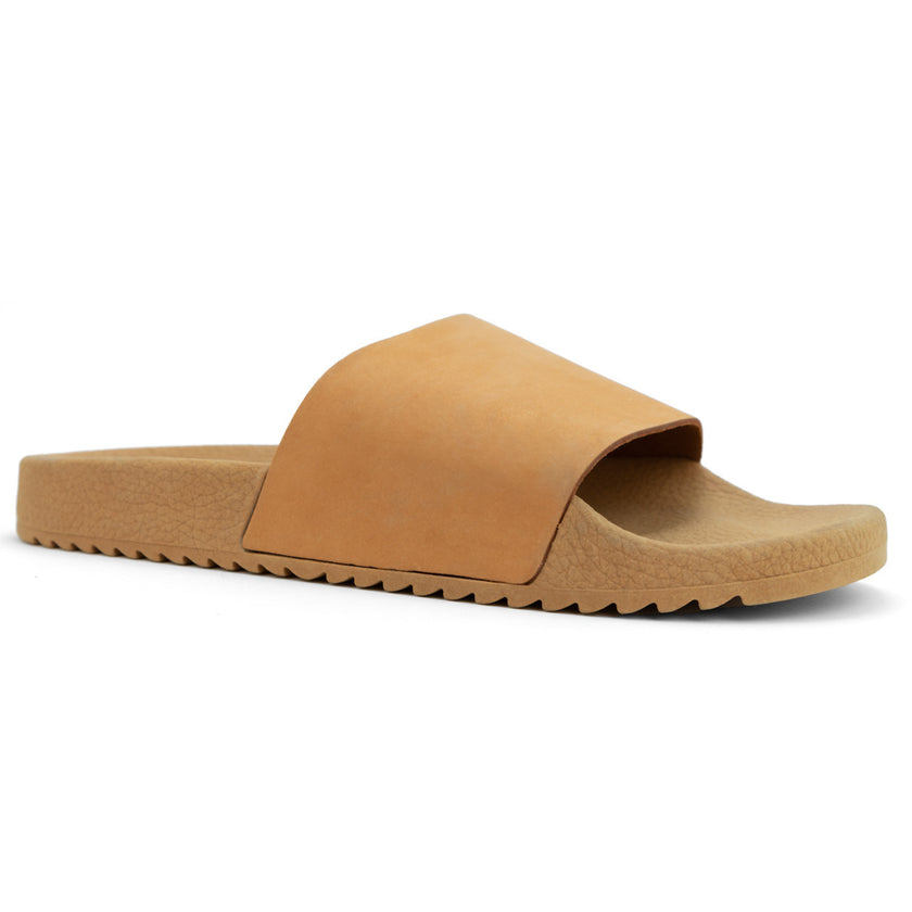 Close up of leather flatforms in beige