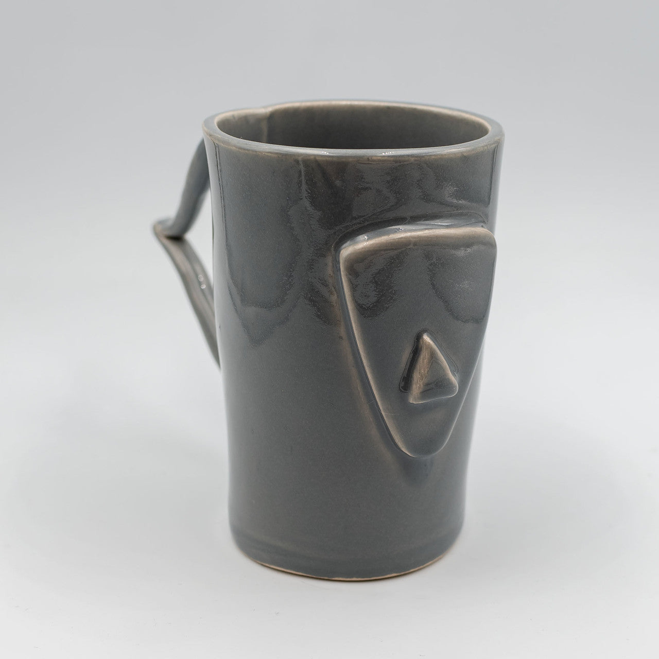 Close up of cycladian style, large ceramic mug in mineral gray