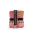Close up of ethnic wild orchid and orange handwoven bucket bag
