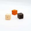 Close up of set of 3 dice, ancient toy