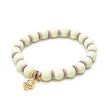 Close up of fatima's hand summer bracelet in mint & levander