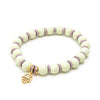 Close up of fatima's hand summer bracelet in mint & levander