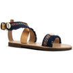 Close up of ethnic, sea shell in  navy blue , handmade leather sandals