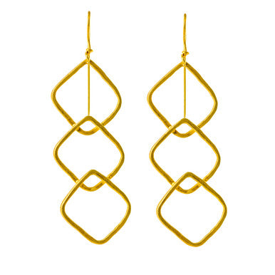 Close up of geometric square earrings, gold plated silver