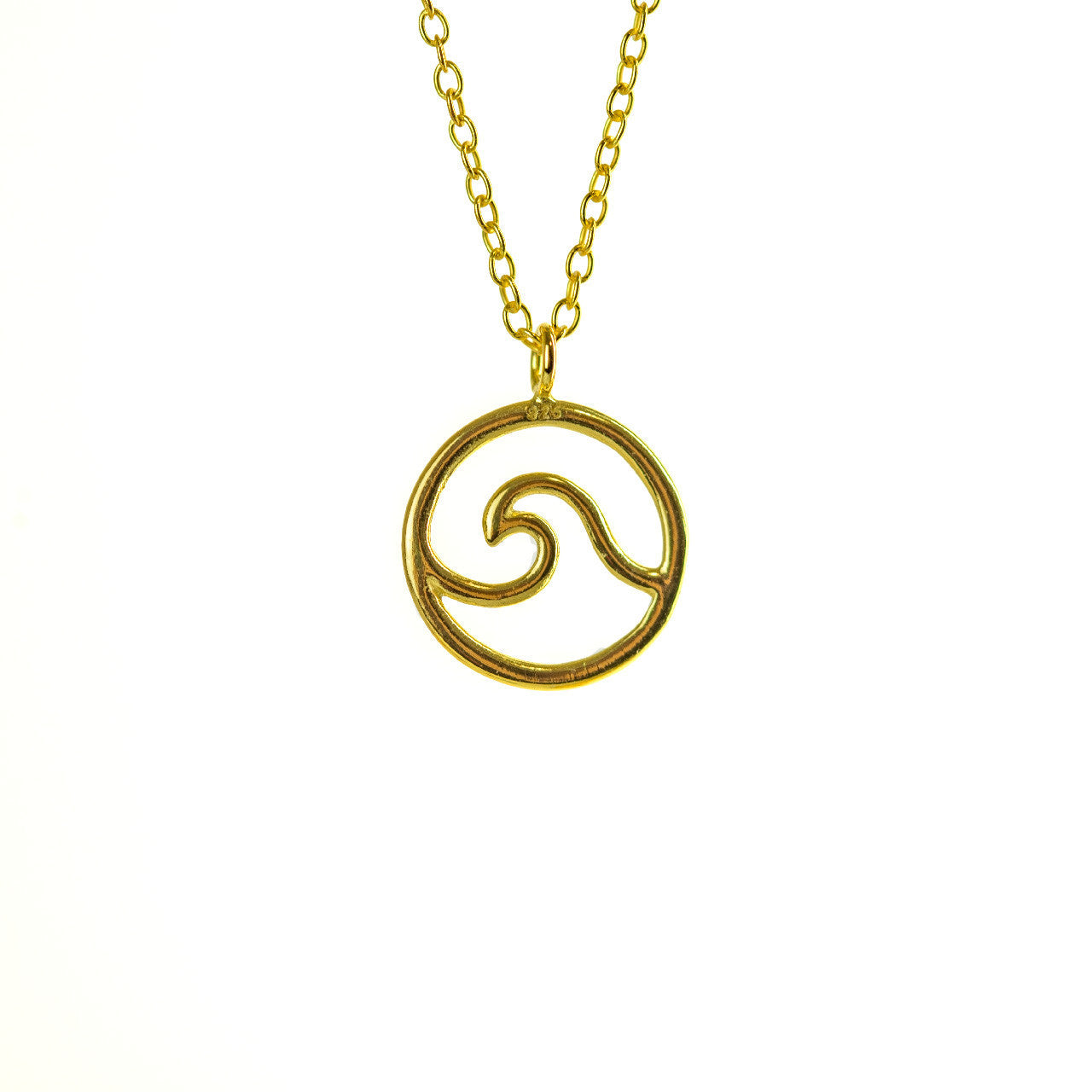 Close up of gold sea wave necklace