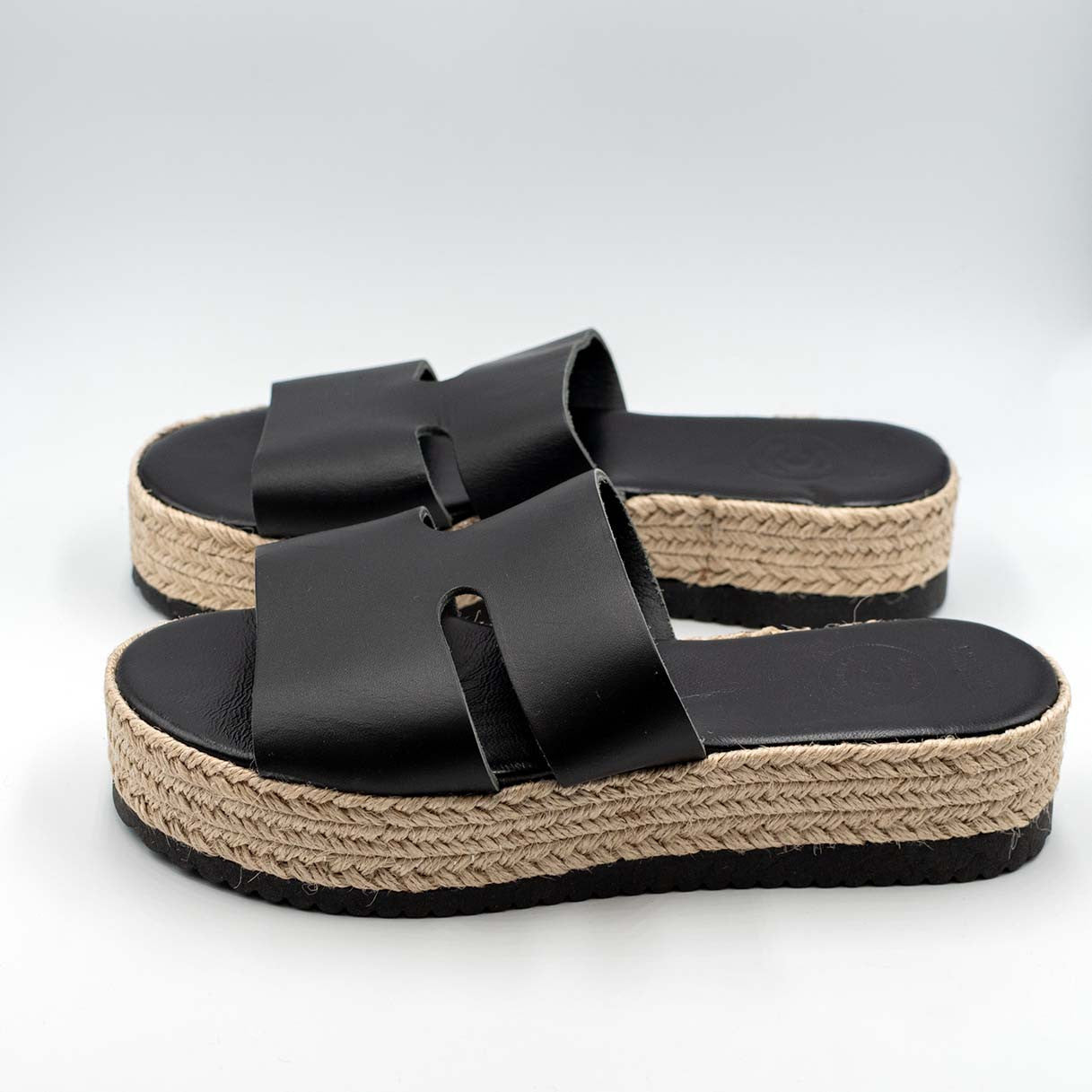 Close up of h design, platform, handcrafted leather  sandals