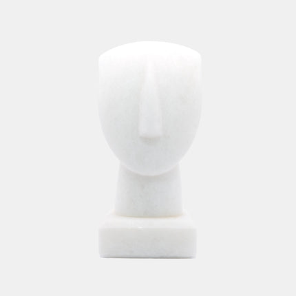 The image shows a simplified representation of a human head and neck on a base, likely a mannequin or a sculptural form. I...
