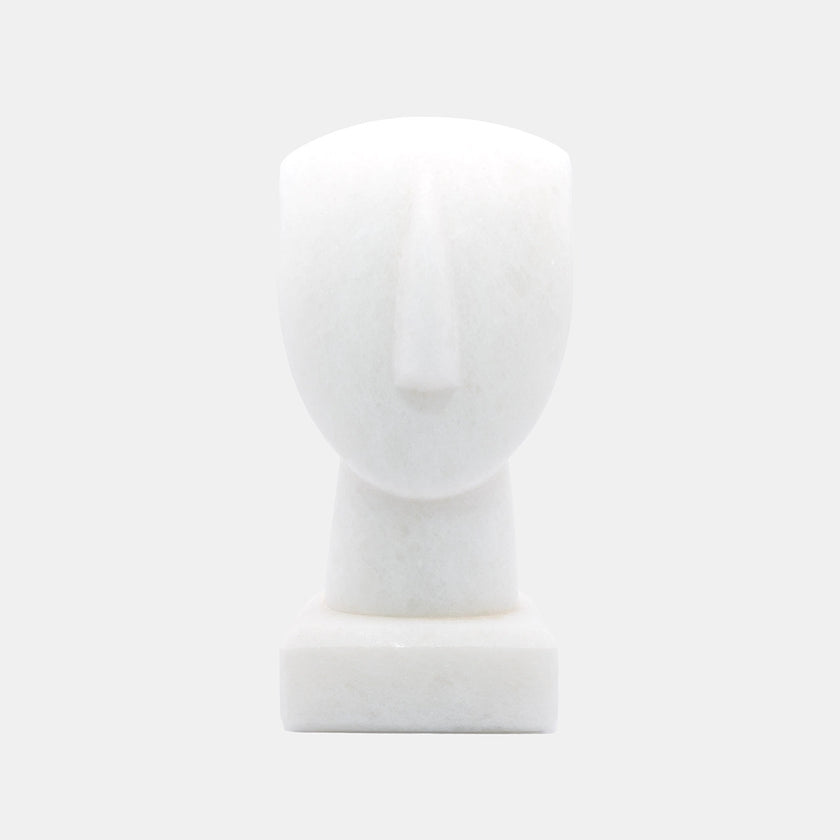 The image shows a simplified representation of a human head and neck on a base, likely a mannequin or a sculptural form. I...