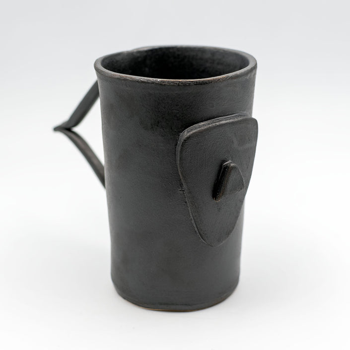 Close up of cycladian style, large ceramic mug in gray