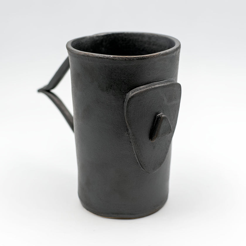 Close up of cycladian style, large ceramic mug in gray