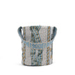 Close up of shades of blue and brown handwoven bucket bag