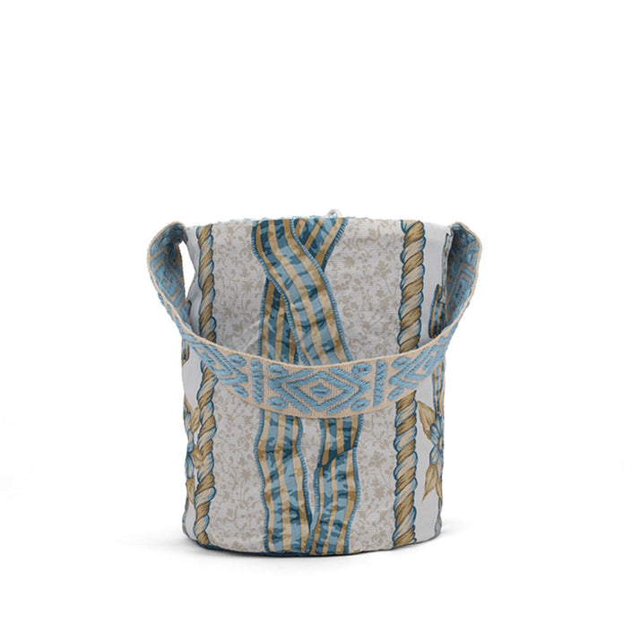 Close up of shades of blue and brown handwoven bucket bag