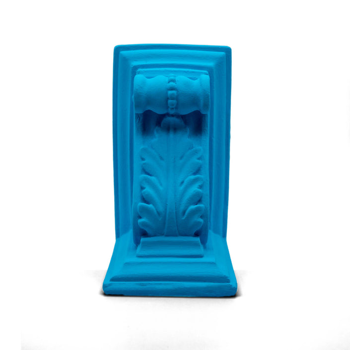 Close up of akrokeramo book end in light blue