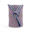 Close up of lilac and beige handwoven bucket bag