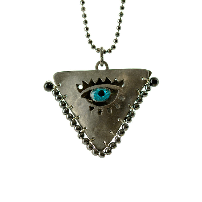 Close up of all black filakto silver talisman charm pendant