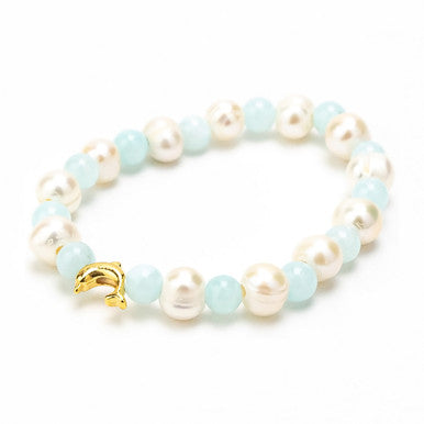Close up of pearls, baby blue beads & gold dolphin bracelet
