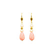 Close up of pearly pink stone hoop handcrafted earrings