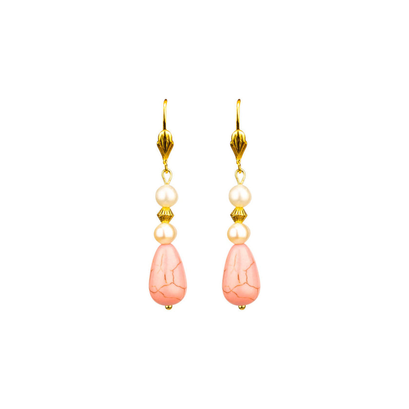 Close up of pearly pink stone hoop handcrafted earrings