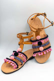 Close up of gladiator in pink, handmade leather sandals