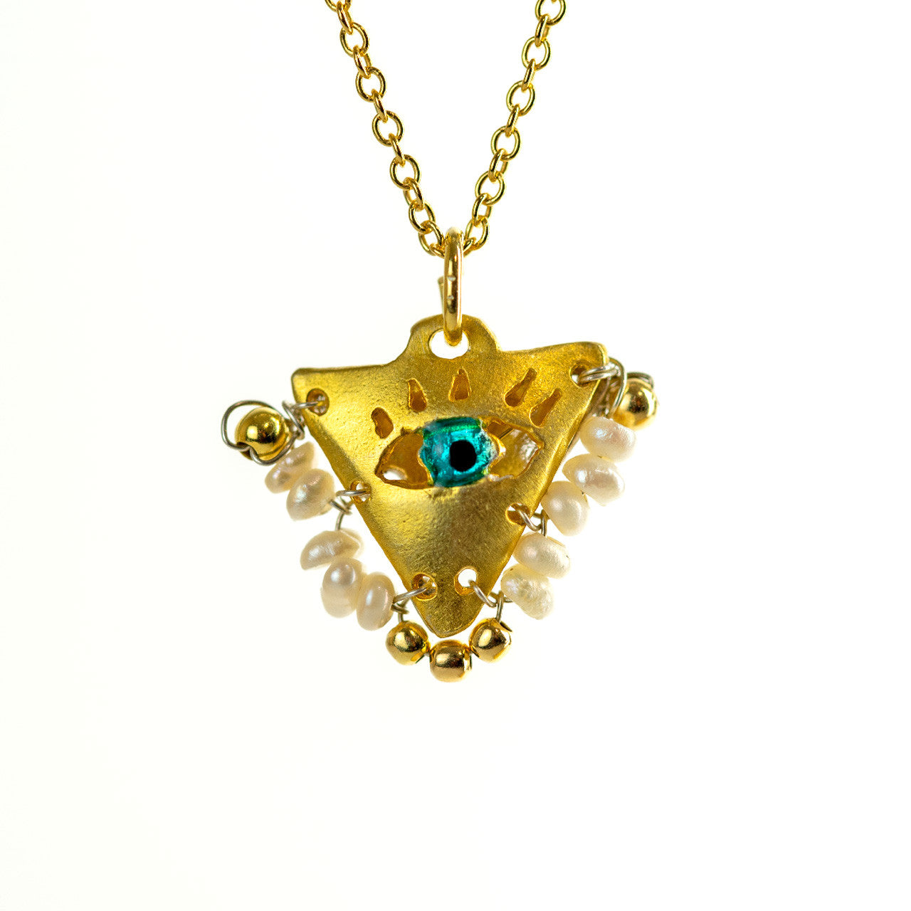 Gold-plated Filakto evil eye necklace with turquoise center and white pearls, a handcrafted lucky charm pendant inspired by traditional protective amulets from Greek culture.