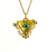 Gold-plated Filakto evil eye necklace with turquoise center and white pearls, a handcrafted lucky charm pendant inspired b...