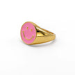 Close up of bubblegum pink smiley ring