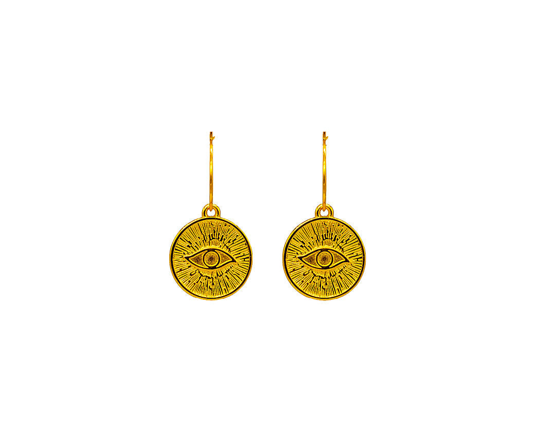 Close up of tereza's gold evil eye, hoop earrings