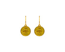 Close up of tereza's gold evil eye, hoop earrings