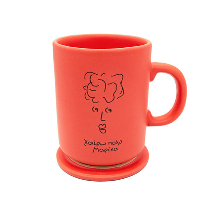 Close up of meet marika ceramic coffee mug & coaster in terracotta