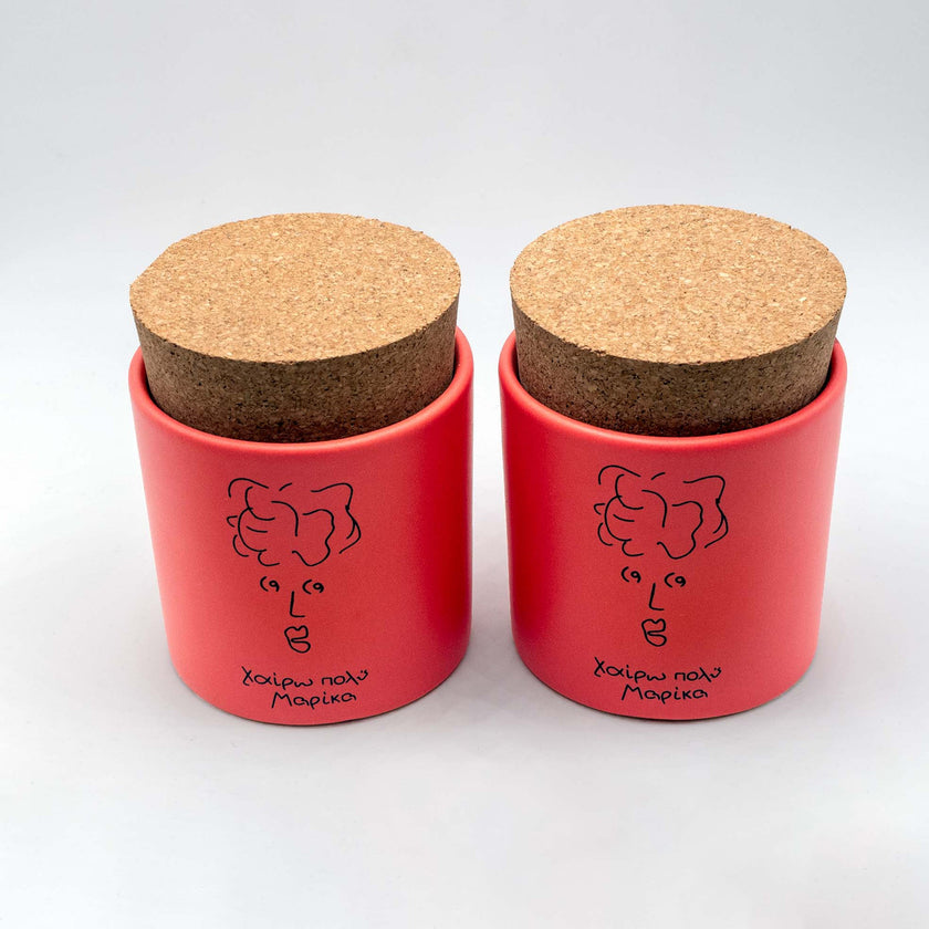 Close up of set of 2 meet marika sugar/coffee jar
