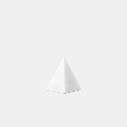 This image presents a close-up view of Thassos White Marble Small Pyramid Sculpture, highlighting their intricate patterns...