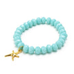 Close up of turquoise sparkly rocks & gold starfish bracelet
