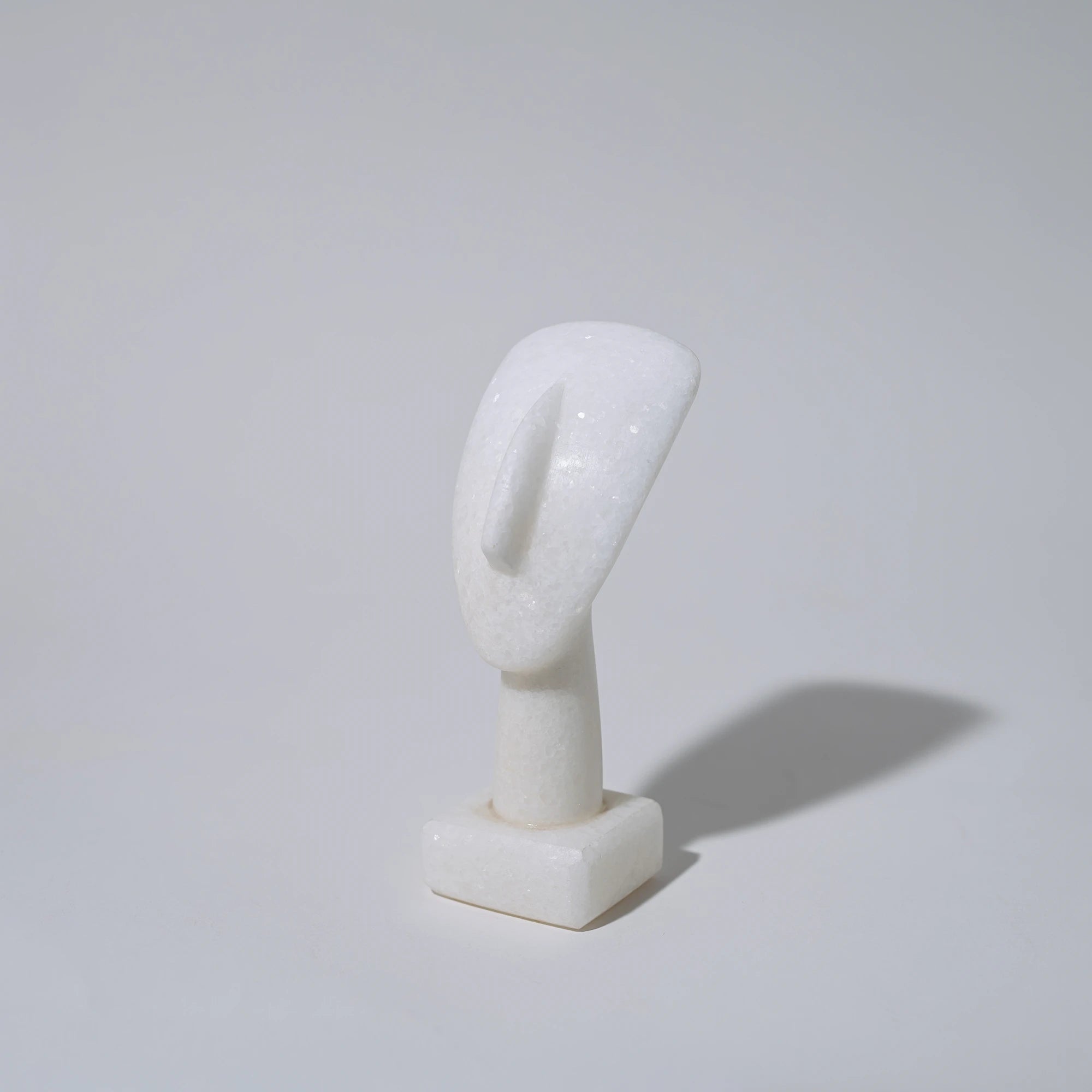 Close up of small cycladic marble head sculpture 11cm