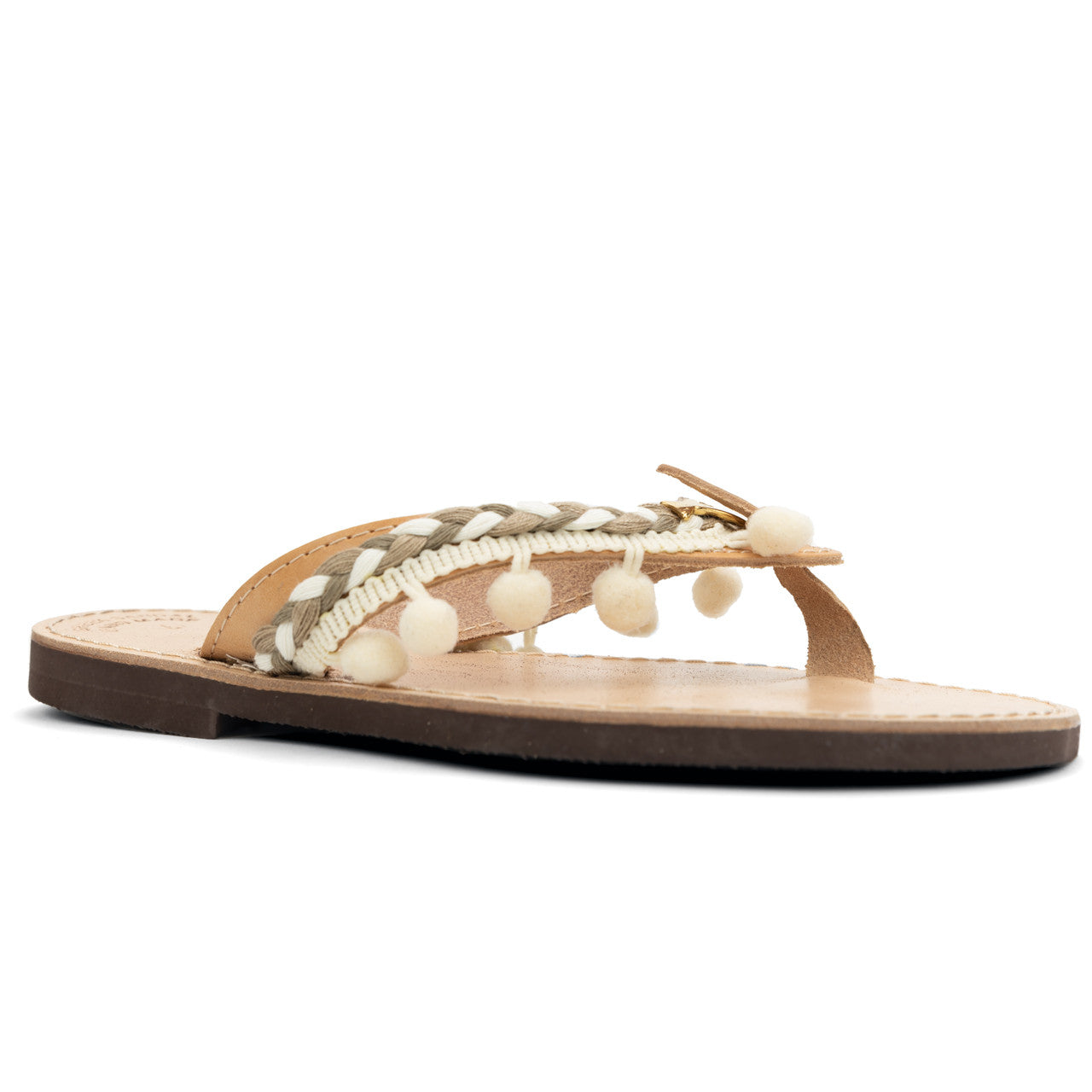 Close up of gold fish, handmade leather sandals, in beige