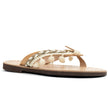 Close up of gold fish, handmade leather sandals, in beige