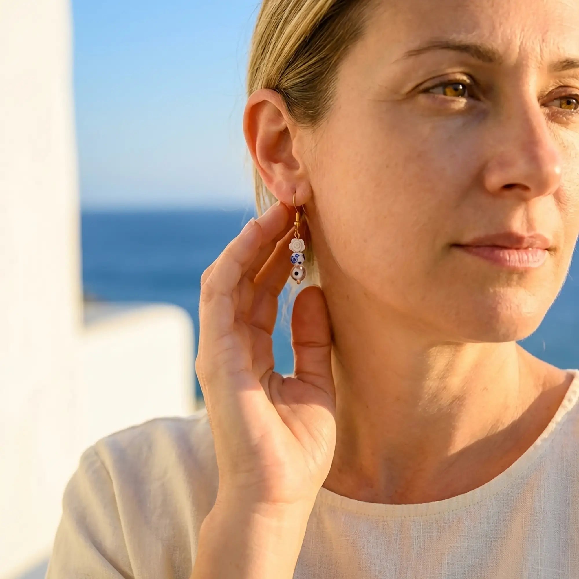 terezas-naxos-cycladic-rose-mati-earrings-worn