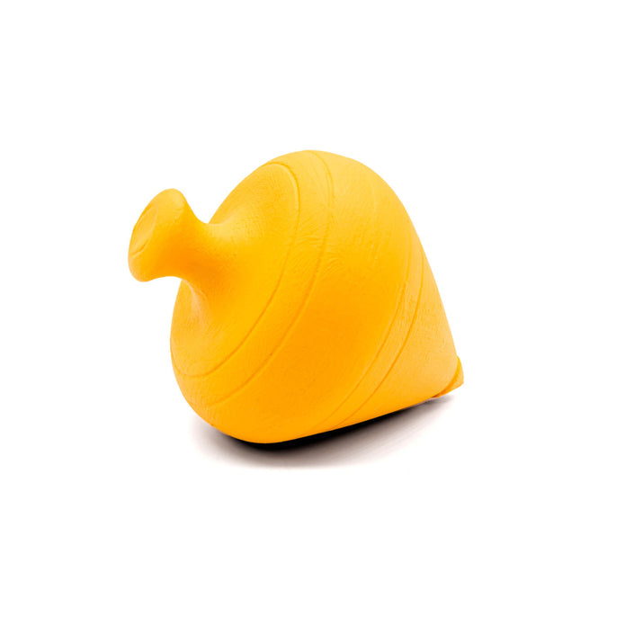 Close up of ceramic stromvos (whirligig), ancient greek toy, in corn yellow
