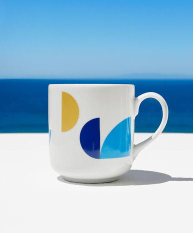 Close up of pieces of greece coffee ceramic mug