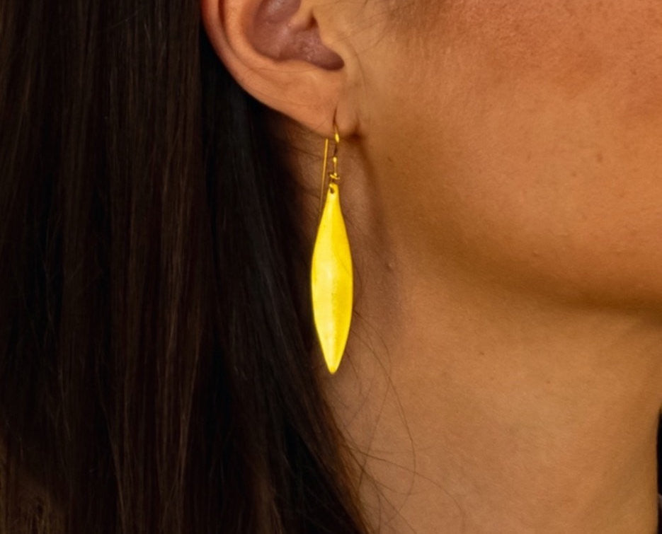 Close up of handcrafted greek olive leaf earrings