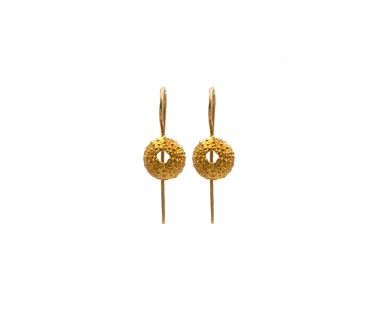 Close up of urchin small earrings in gold plated silver