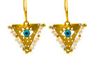 Gold-plated silver earrings with Pearl White beads and blue evil eye charm. Handcrafted jewelry inspired by the Filakto, a...