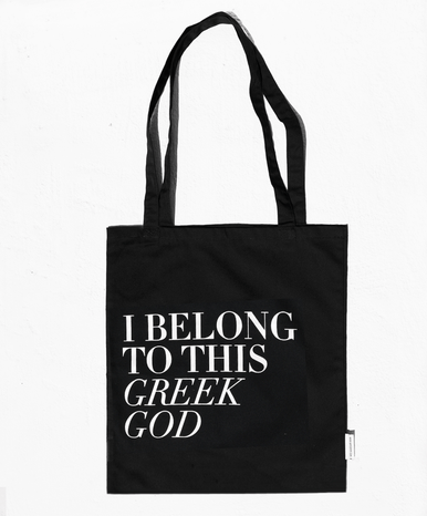 Close up of greek god tote bag