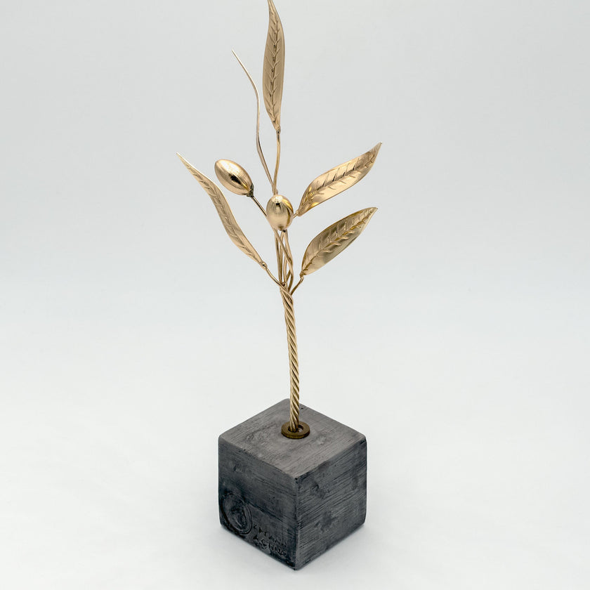 Close up of golden olive branch, handcrafted