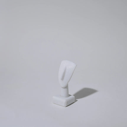 Close up of mini cycladic marble head sculpture 7cm